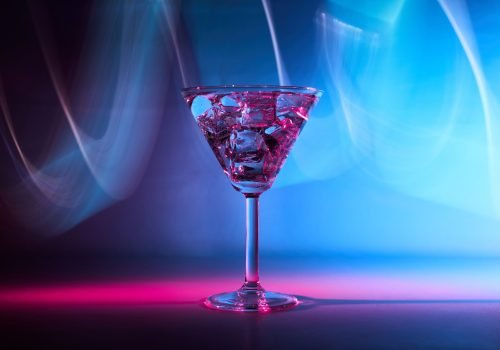 martini-cocktail-drink-in-neon-iridescent-pink-and-2024-12-04-06-13-48-utc